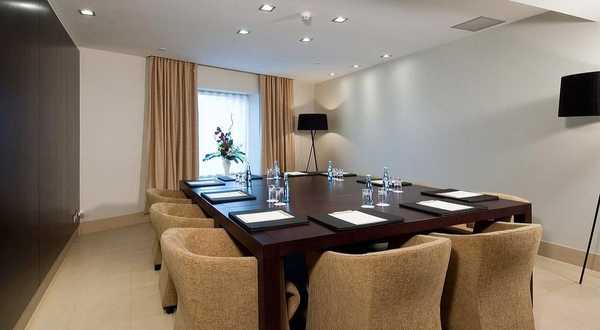 Meeting room with boardroom table at CH Bucharest hotel